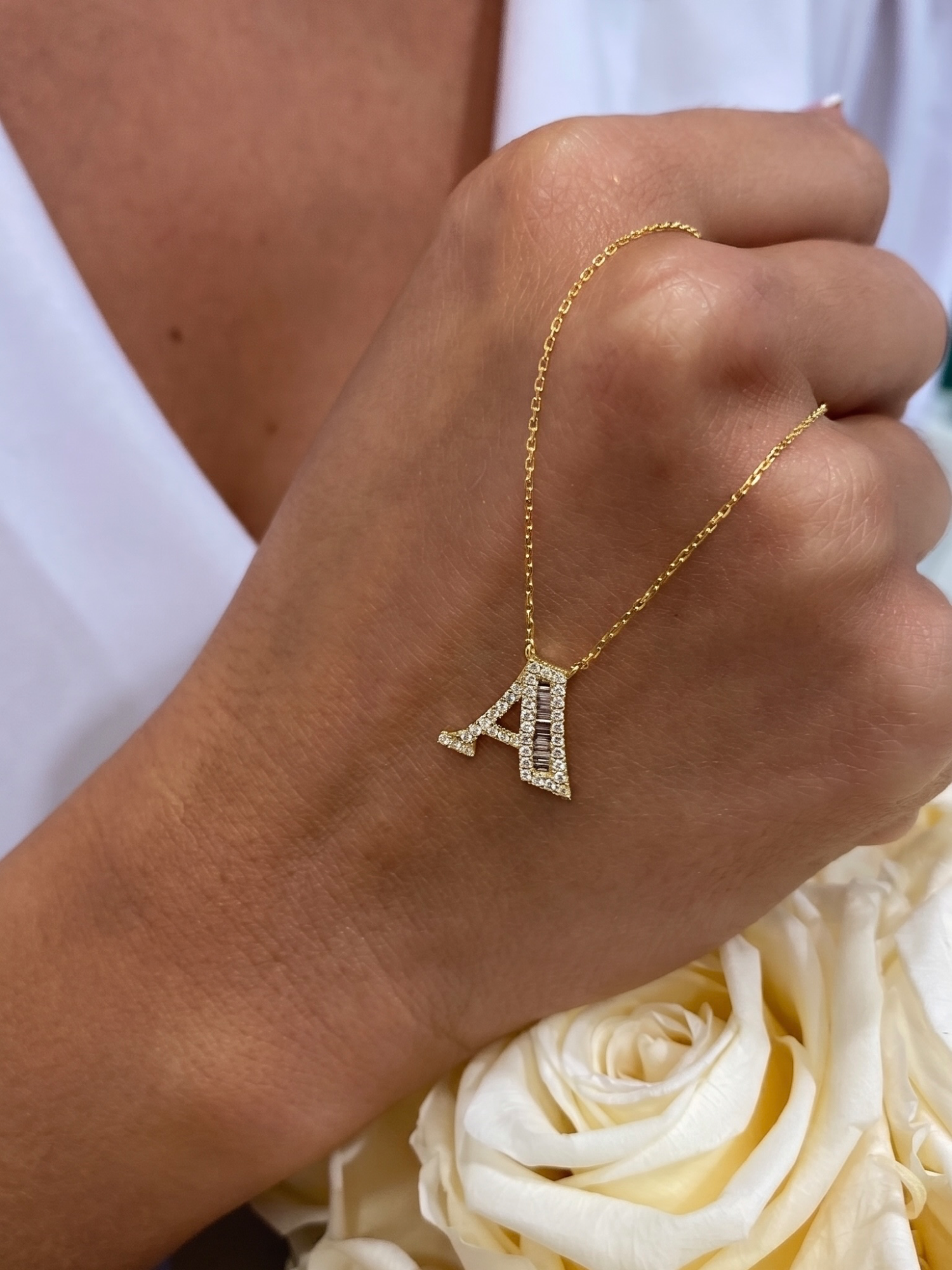 A Letter "Collier Première Lettre™" Necklace in 18k yellow gold, photo 2