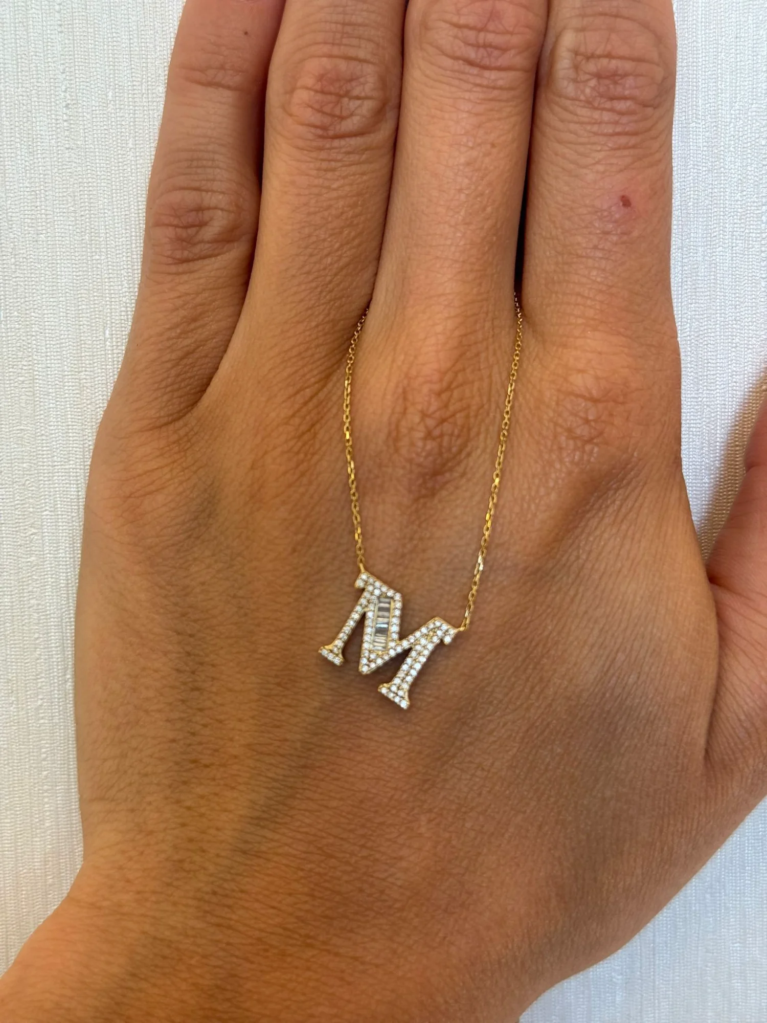 M Letter Necklace "Collier Première Lettre™" in 18k yellow gold, photo 2